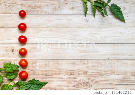List cherry tomatoes on wooden table background 131462216