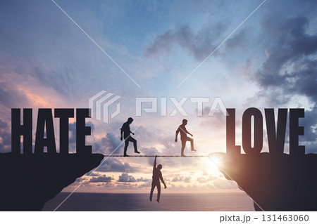 Silhouettes of people walking on a rope between rocks, relationship concept Silhouettes of people walking on a rope between rocks, relationship concept 131463060