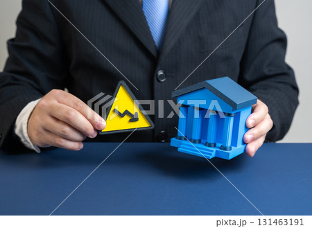 Threat of decline in bank asset liquidity. Decline in profits and financial stability. Useful for economic crisis, investment risks, monetary policy, banking sector, corporate finance, stock markets. Threat of decline in bank asset liquidity. Decline in profits and financial stability. Useful for economic crisis, investment risks, monetary policy, banking sector, corporate finance, stock markets. 131463191