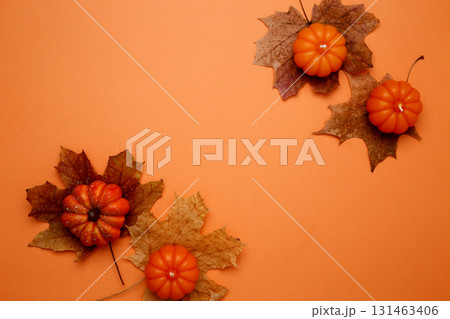 Halloween decoration pumpkins maple leaves autumn festive mood 131463406