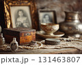 Vintage family heirlooms on wooden table 131463807