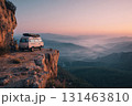 Camper van by cliff edge with ocean view 131463810