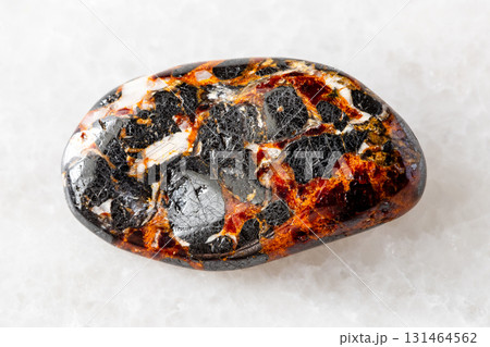 polished franklinite and zincite minerals on white polished franklinite and zincite minerals on white 131464562