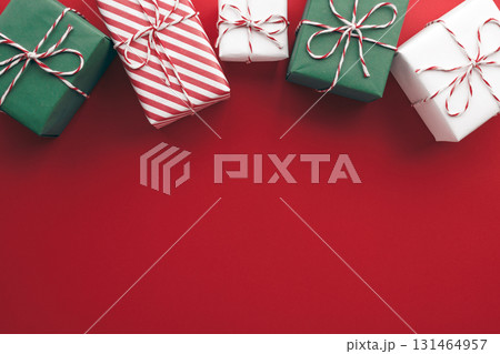 Gift boxes on color background, flat lay, space for text 131464957