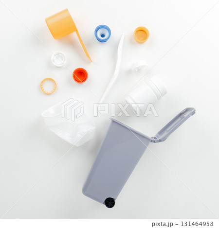 Plastic in garbage bin on white background 131464958