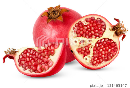 Pomegranate fruit, piece of pomegranate full of seeds isolated on a white background with clipping path. Pomegranate fruit, piece of pomegranate full of seeds isolated on a white background with clipping path. 131465147