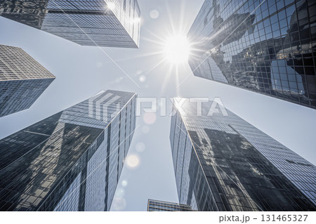 Low angle view of modern glass skyscrapers with bright sun flare and reflections. AI generated Low angle view of modern glass skyscrapers with bright sun flare and reflections. AI generated 131465327