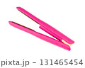Cordless pink hair straightener, isolated on a white background. This beauty styling tool is perfect for showcasing products, beauty tutorials, or salon services, e-commerce, travel blogs, or hair 131465454