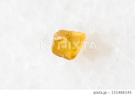 sample of raw jargoon zircon crystal on white 131466145
