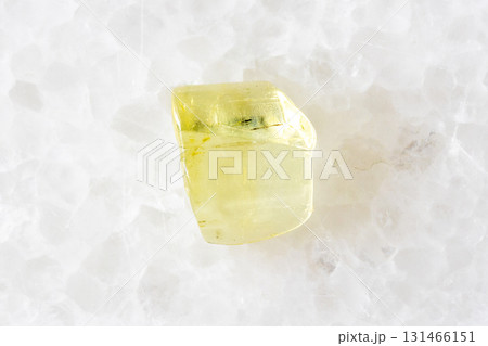 unworked heliodor yellow beryl crystal on white unworked heliodor yellow beryl crystal on white 131466151