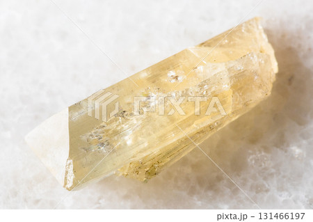 sample of raw danburite mineral on white marble sample of raw danburite mineral on white marble 131466197