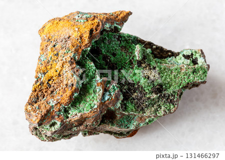 raw conichalcite mineral on limonite rock on white 131466297