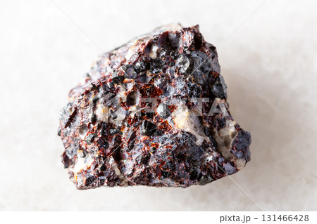 raw franklinite and zincite minerals on white 131466428