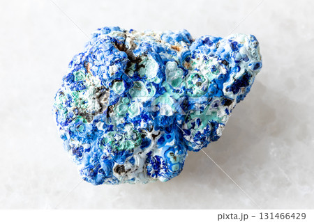 raw azurite and gibbsite mineral on white marble raw azurite and gibbsite mineral on white marble 131466429