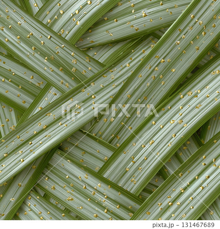 Close up of woven pattern made from green pandan leaves with tiny gold accents, showcasing intricate craftsmanship and texture. design is traditional and elegant 131467689