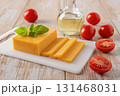 Slised cheddar cheese and tomatoes close-up. 131468031