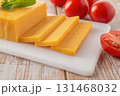 Sheddar cheese slices close-up. 131468032