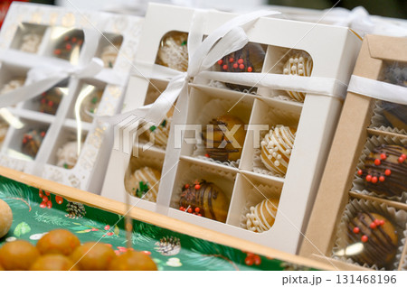 A selection of handmade chocolates in gift boxes A selection of handmade chocolates in gift boxes 131468196
