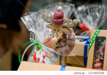 Wooden deer figurine as a Christmas decoration 131468206