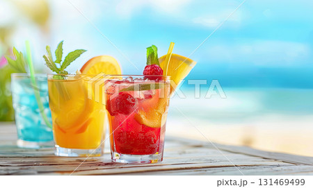 Orange cocktail glass with fruit slice on tropical beach background. banner with copy space. The concept of rest,   131469499