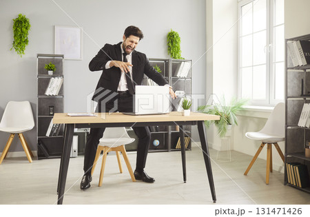 Man in suit dancing during break at workplace Man in suit dancing during break at workplace 131471426