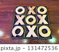 Tic-tac-toe game on a table 131472536