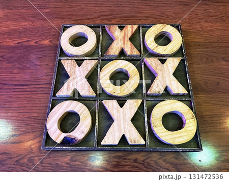 Tic-tac-toe game on a table 131472536