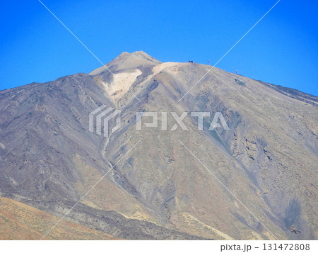 A scenic view of a volcanic mountain under a clear blue sky in Teide National Park, Tenerife 131472808