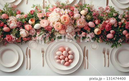 Happy Easter, banner Easter decorated table, in center blue table is plate with eggs, bouquet of various spring tulips, lily of valley flowers. 131474400