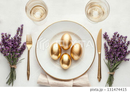 Luxury Happy Easter. Elegant top view, layout, minimalist style, Easter decorated table golden eggs and lavender bouquet 131474415