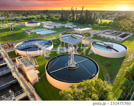 Water treatment facility with multiple tanks and filtration units. Vital infrastructure for sustainable water management and distribution Water treatment facility with multiple tanks and filtration units. Vital infrastructure for sustainable water management and distribution 131475760