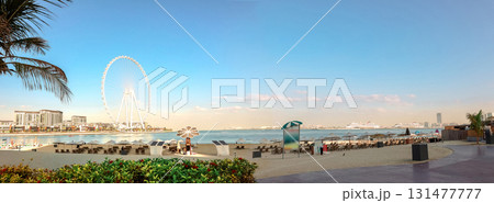 Panoramic view of Bluewaters Island, famous Ferris Wheel, JBR beach area, UAE. Aerial sky at highest buildings in central Dubai Marina, United Arab Emirates 131477777