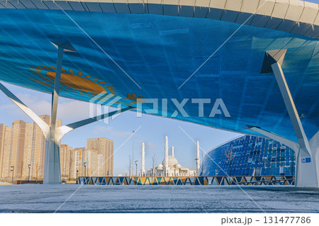 Modern architectural urbanistic city Astana. Futuristic buildings, mosque, Nur-Sultan, Astana, Kazakhstan. High quality photo 131477786