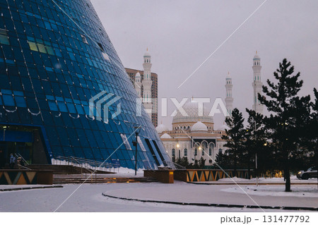 Modern architectural urbanistic city Astana. Futuristic buildings, pyramids, mosque of night city, Nur-Sultan, Astana, Kazakhstan. High quality photo Modern architectural urbanistic city Astana. Futuristic buildings, pyramids, mosque of night city, Nur-Sultan, Astana, Kazakhstan. High quality photo 131477792