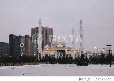 Panoramic view of snow-white modern Hazaret Sultan mosque early morning, Nur-Sultan, Astana, Kazakhstan. High quality photo Panoramic view of snow-white modern Hazaret Sultan mosque early morning, Nur-Sultan, Astana, Kazakhstan. High quality photo 131477922