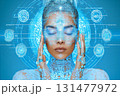 Futuristic cyber woman with glowing blue interface overlay and closed eyes, digital shaman concept in high-tech style 131477972