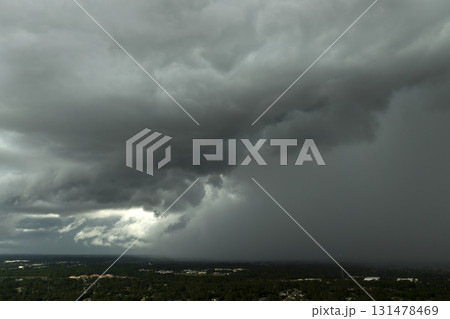 Stormy clouds forming during thunderstorm on dark sky. Moving and changing cloudscape weather Stormy clouds forming during thunderstorm on dark sky. Moving and changing cloudscape weather 131478469