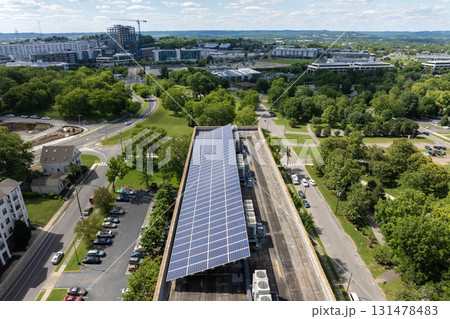Solar rooftop on apartment condo building in Nashville, Tennessee. Production of clean ecological electrical energy. Renewable electricity with zero emission Solar rooftop on apartment condo building in Nashville, Tennessee. Production of clean ecological electrical energy. Renewable electricity with zero emission 131478483
