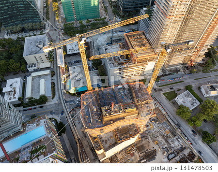 Skyscraper construction in Miami, Florida at sunset. USA real estate development. Big city urban landscape with high-rise buildings 131478503