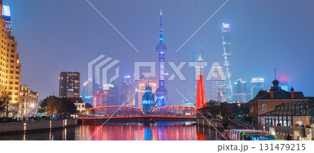 Cityscape view of Shanghai city at night. Skyscraper of Lujiazui in Pudong, view from The Bund of Shanghai, China. landmark and popular for tourism attractions. Travel and Vacation concept 131479215