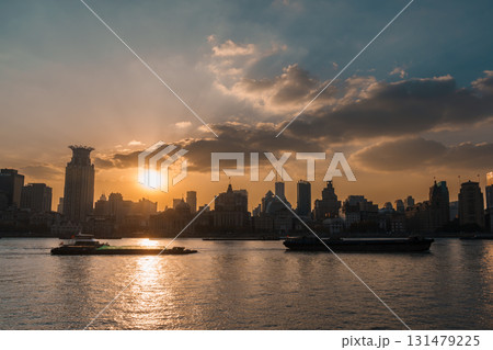 Cityscape view of Shanghai city at sunset. Skyscraper of the Bund, view from Lujiazui in Pudong of Shanghai, China. landmark and popular for tourism attractions. Travel and Vacation concept 131479225