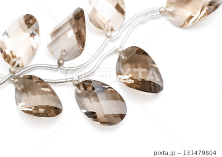 スモーキークォーツのファセットブリオレットビーズ 131479804