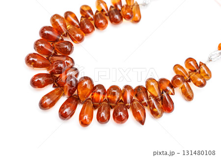 ヘソナイトガーネットのファセットブリオレットビーズ 131480108