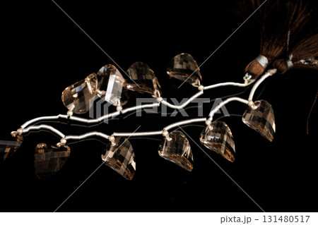 スモーキークォーツのファセットブリオレットビーズ 131480517