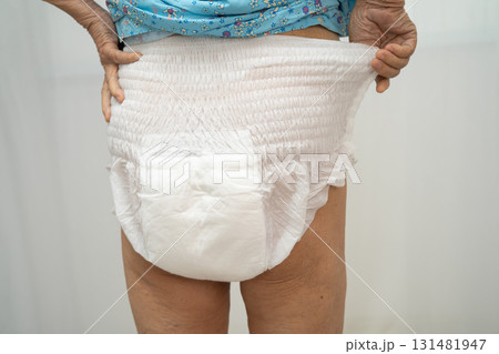 Asian senior woman patient wearing incontinence diaper. Asian senior woman patient wearing incontinence diaper. 131481947