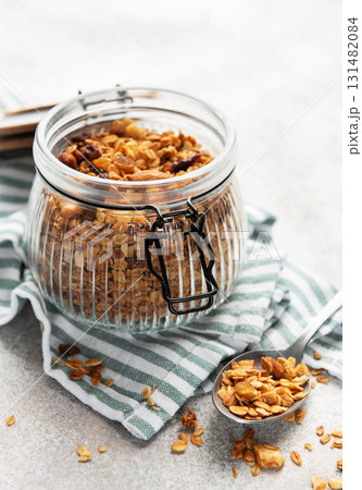 Homemade granola cereal with oats nuts and dried fruits Homemade granola cereal with oats nuts and dried fruits 131482084