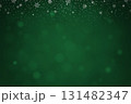Green christmas background with falling snowflakes 131482347