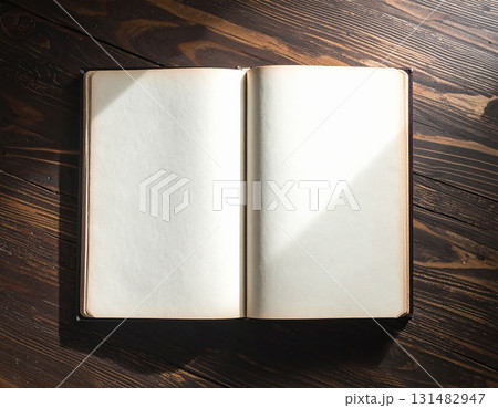 open book on wooden table 131482947