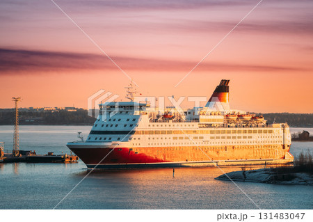 Helsinki, Finland. View Of Modern Ferry Ferryboat Floating Island At Sunrise Sky 131483047