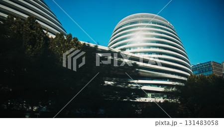 Beijing, China. Galaxy SOHO is an urban complex building located in Beijing, China. Built between 2009 and 2012, it is the first of three buildings designed by Iraqi-British architect Zaha Hadid Beijing, China. Galaxy SOHO is an urban complex building located in Beijing, China. Built between 2009 and 2012, it is the first of three buildings designed by Iraqi-British architect Zaha Hadid 131483058